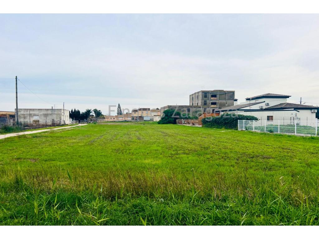 Building plot of 3,859 m² for sale in Deltebre.The plot has an approximate frontage of 27 m and a depth of approximately 142 m.